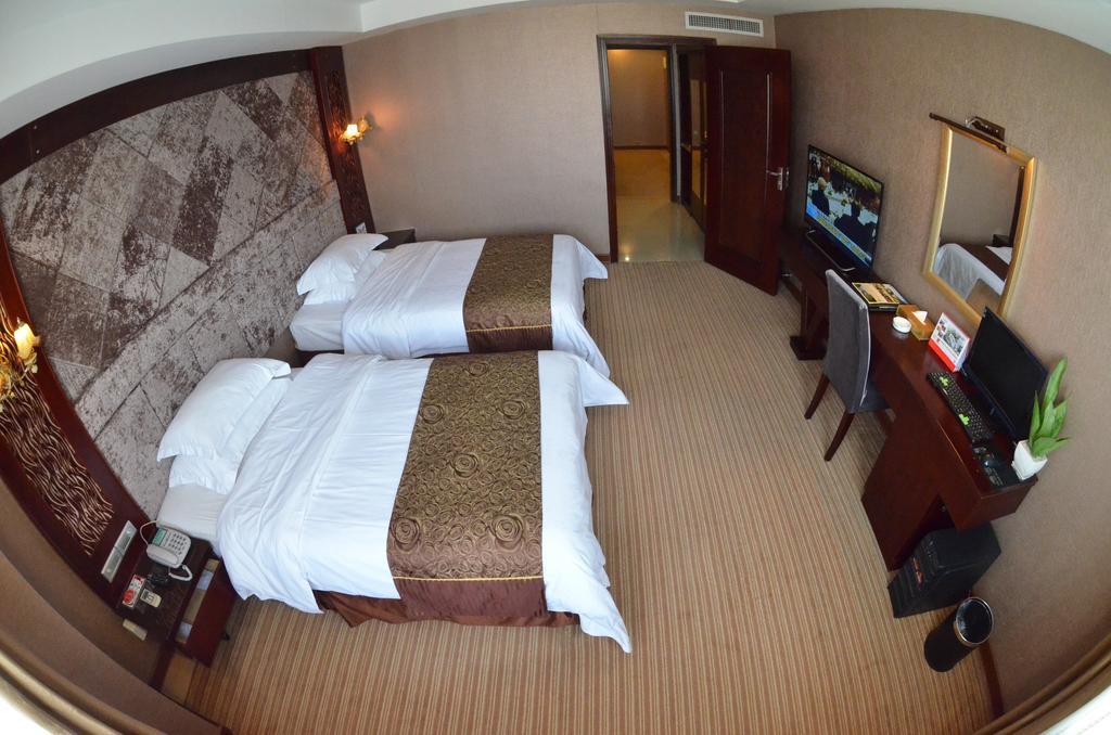 Xiamen Wanjia Oriental Hotel Værelse billede